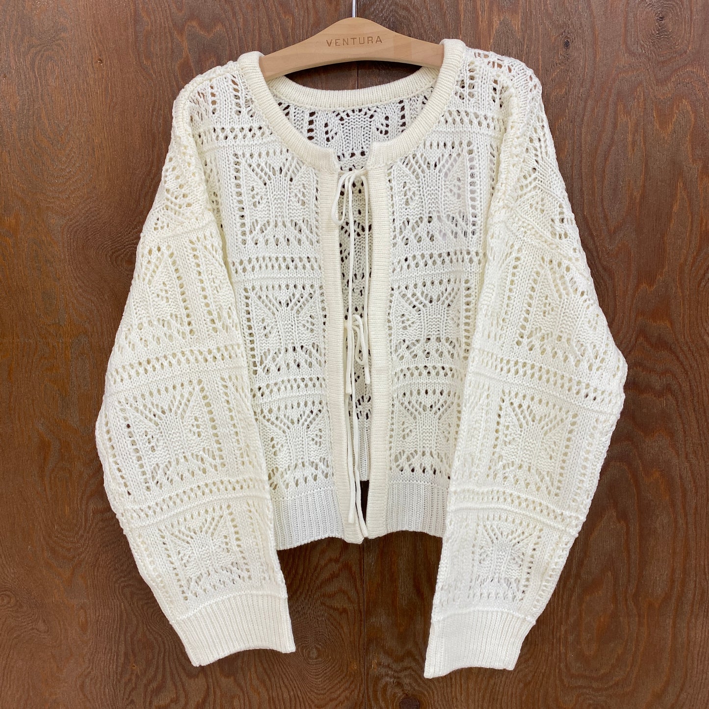 179/WG 透かし編みリボンカーディガン