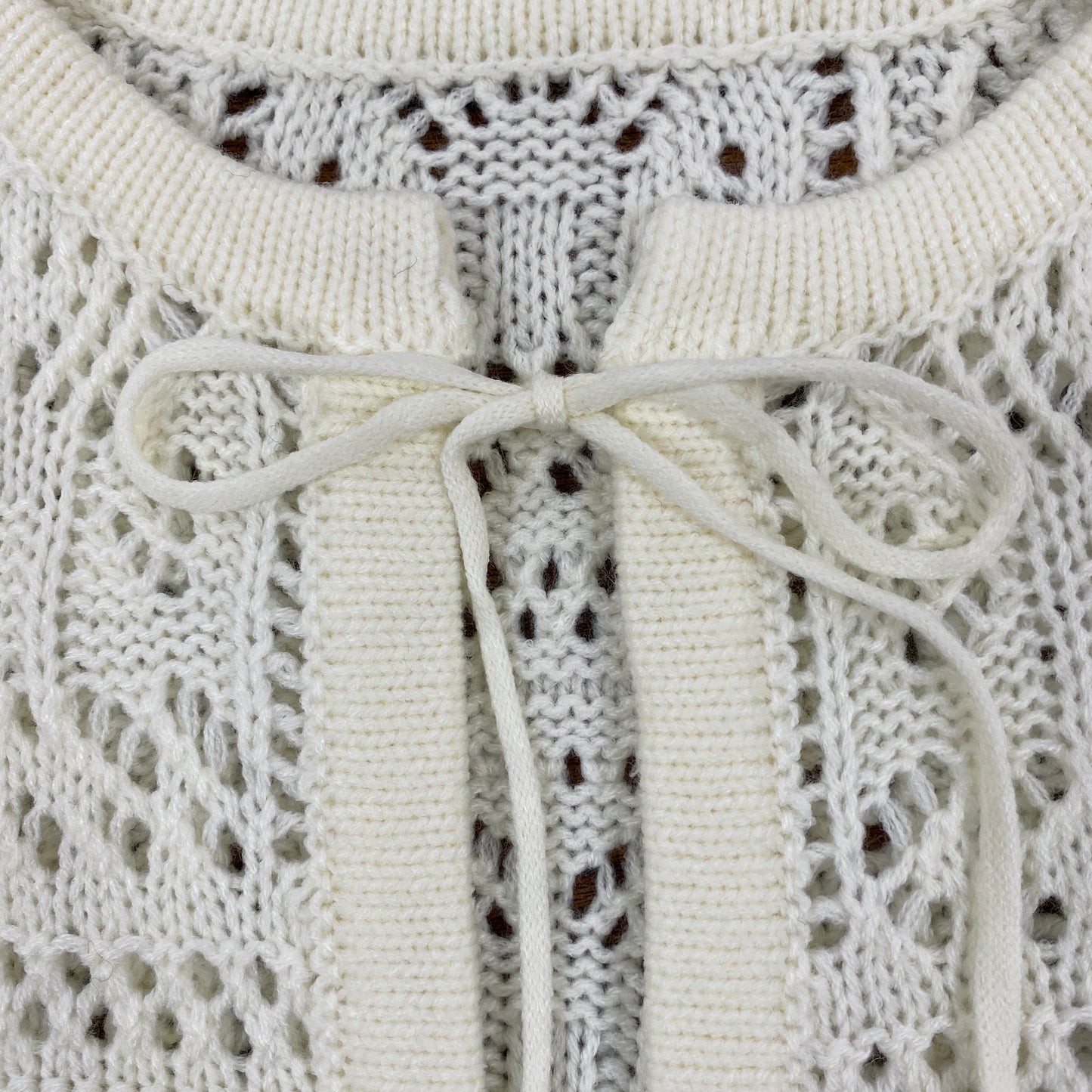 179/WG 透かし編みリボンカーディガン