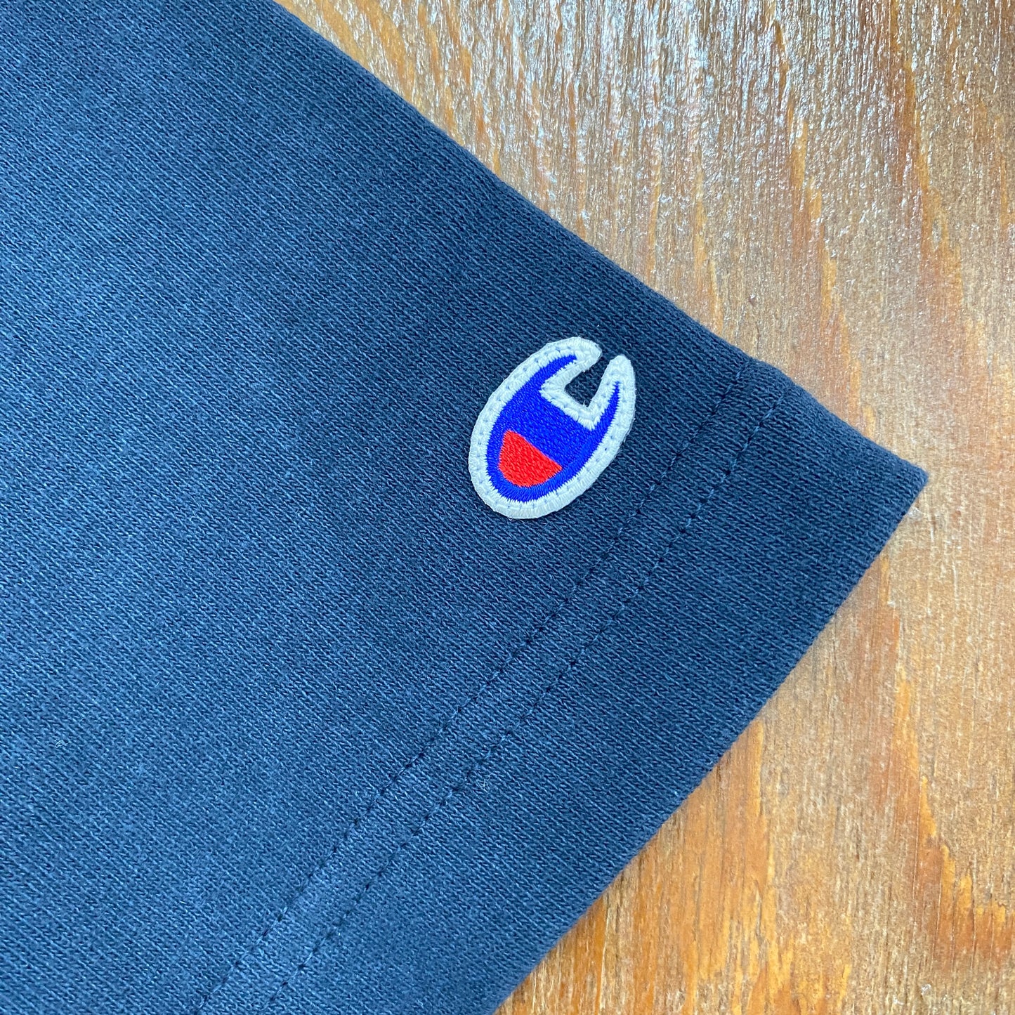 Champion 文字ロゴ半袖Tシャツ